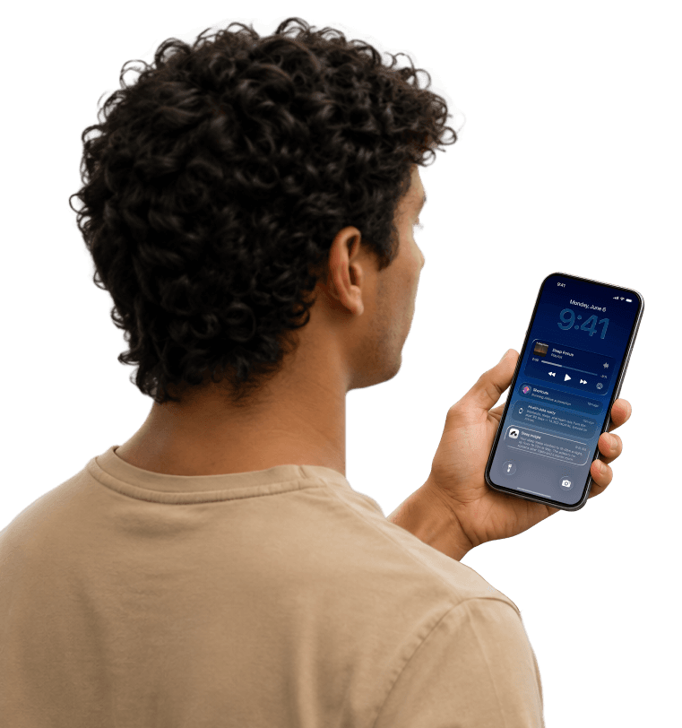 Person holding phone with Arkive app